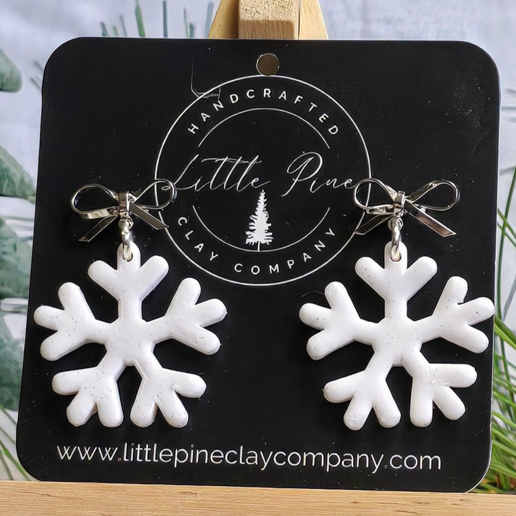 Silver Bow Snowflake Earrings