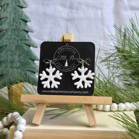 Silver Bow Snowflake Earrings